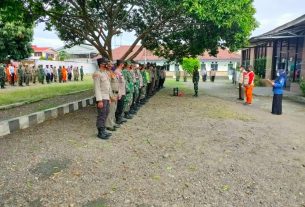 Serma Desrizal memimpin Apel pengecekan personel Satgas Percepatan Penanganan Covid 19